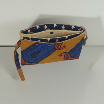 Artisan-Inspired Wristlet Clutches with Unique Prints & Handcrafted Details